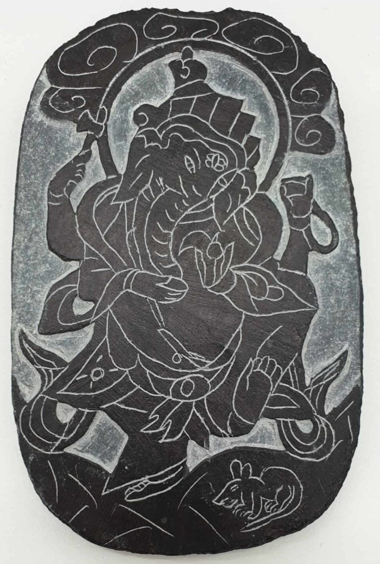 slate ganesha carving in relief. On light grey slate with mouse. A spiritual carving perfect for an altar. Can be used indoor or outdoor