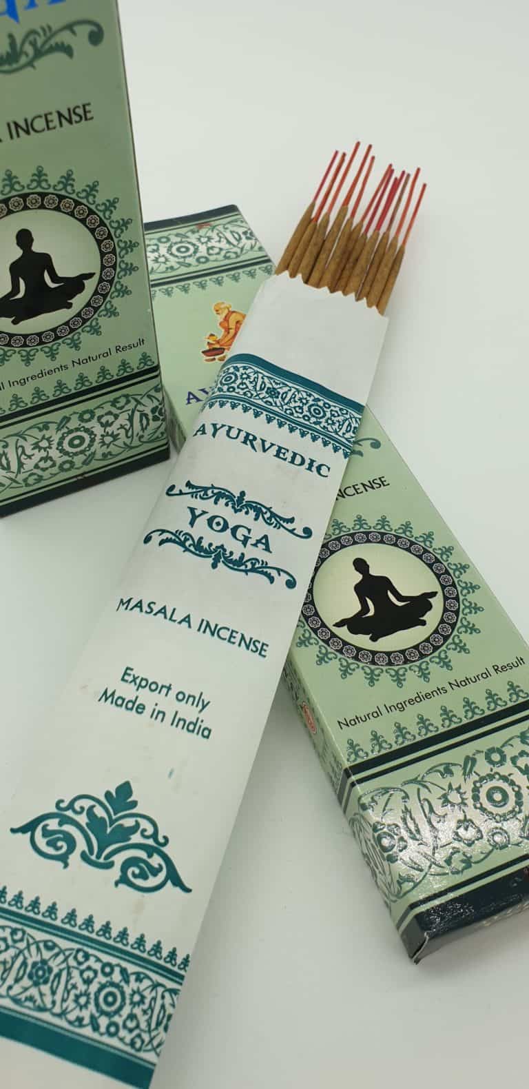 Ayurvedic incense blended for yoga. 100% natural, hand rolled. A long blue and turquoise box with an inner paper sleeve. 15 sticks. Close up of patterned sleeve.