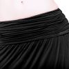 close up of comfort flow black harem yoga pants showing the wide pleated waist band and soft loose legs