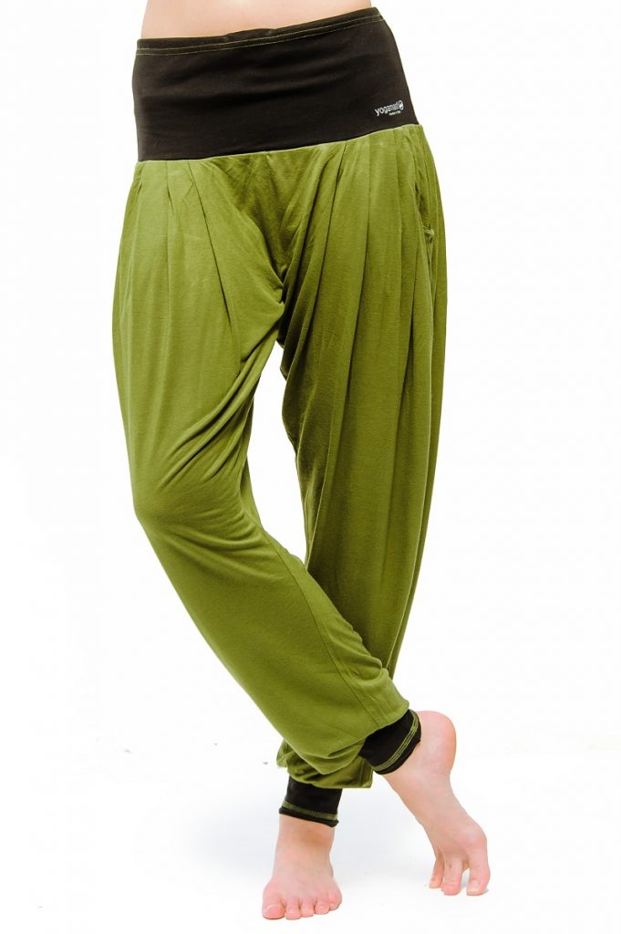 Vinyasa baggy yoga pants with loose olive green fabric and a black wide waist