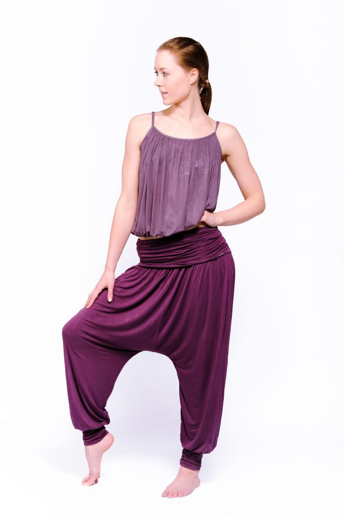 comfort flow purple yoga outfit with lavender support top and plum purple harem pants
