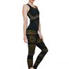 Bhakti Black Yoga Outfit With Gold Accents On a Model Wearing The vest and leggings set